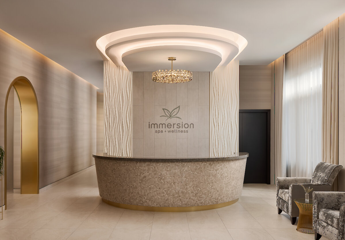 relaxing lounge space in the spa with sheer curtains and soft lighting