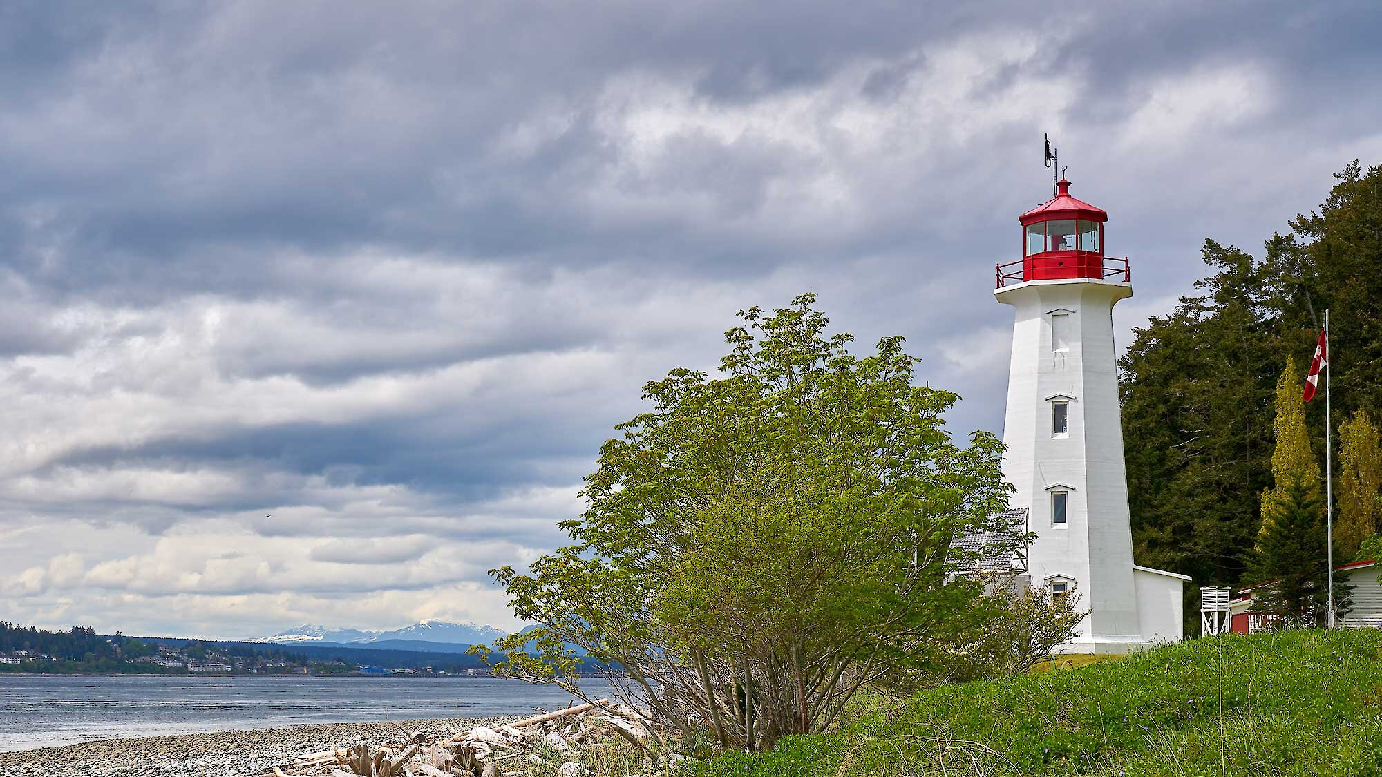Lighthouse on Quadra Island with Campbell River in the distance